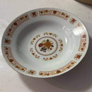 Tatung porcelain serving bowl with a red and gold floral pattern